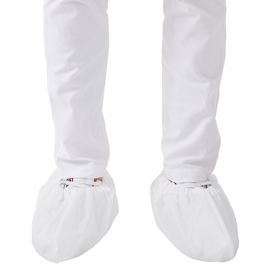 医学のスリップの抵抗力がある使い捨て可能な靴は白い60gを覆う